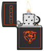 NFL Chicago Bears Windproof Lighter with its lid open and lit.