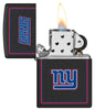 NFL New York Giants Windproof Lighter lit in hand.