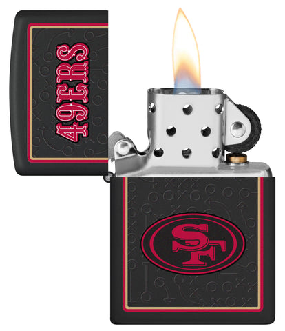 NFL San Francisco 49ers Windproof Lighter with its lid open and lit.
