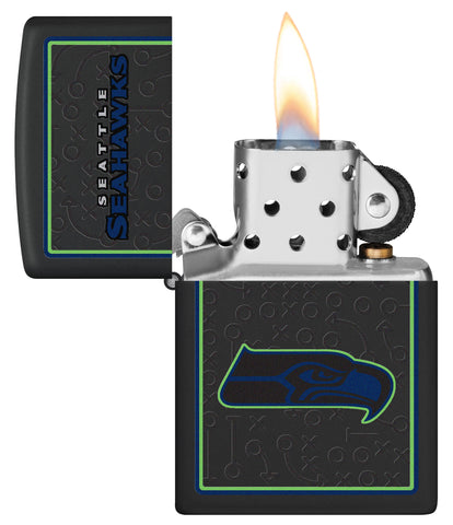 NFL Seattle Seahawks Windproof Lighter lit in hand.