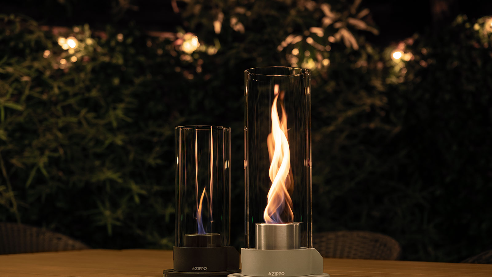 Flamescapes Spiral and Spiral XL on a patio table.