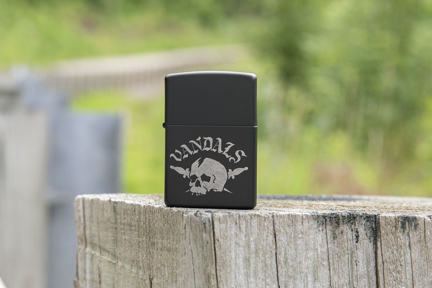 Vandals Lighter on a roadside fence post.