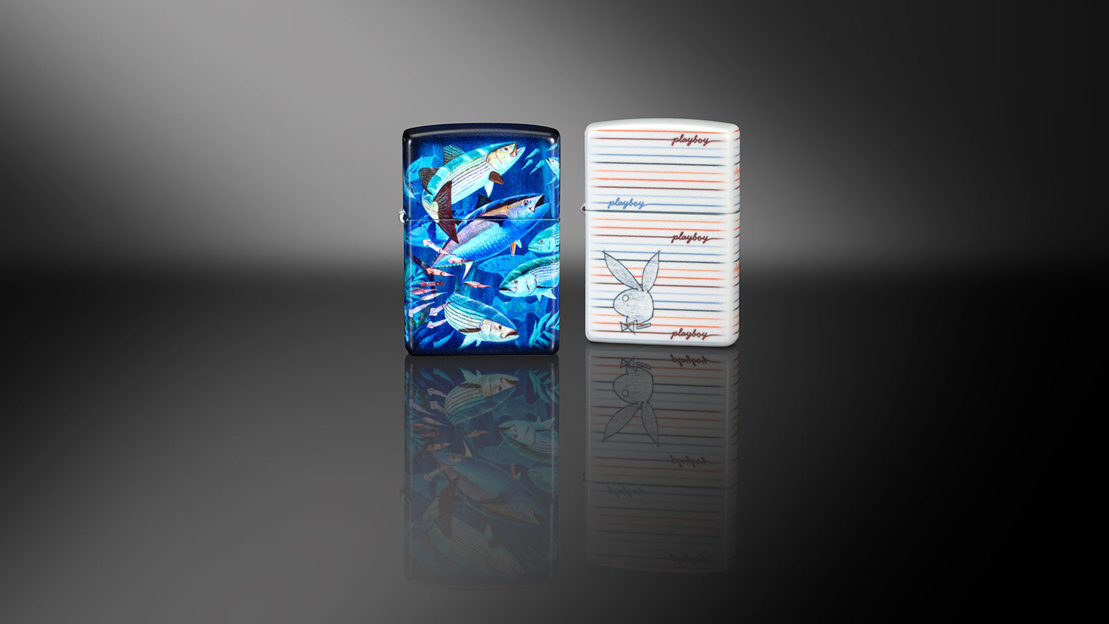 Guy Harvey School of Fish design lighter next to a Playboy design lighter.