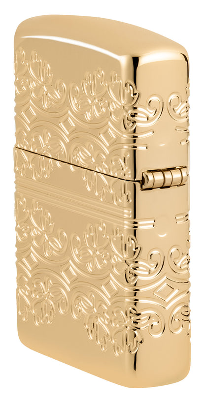 Angled shot of Zippo Lucky Clover Design ArmorÂ® High Polish Gold Plate Windproof Lighter showing the back and hinge side of the lighter.