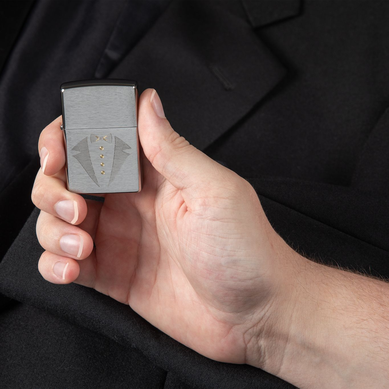 Lifestyle Image of Gold Tux & Bowtie Design Windproof Lighter
