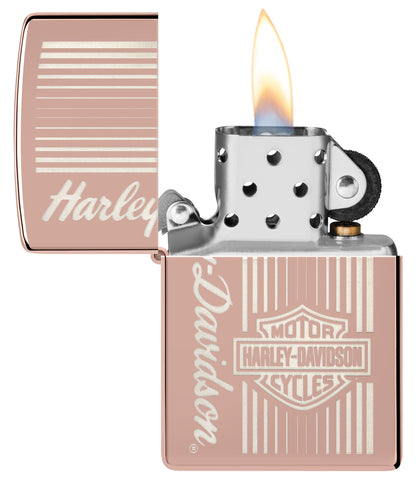 Zippo Harley-DavidsonÂ® High Polish Rose Gold Windproof Lighter with its lid open and lit.