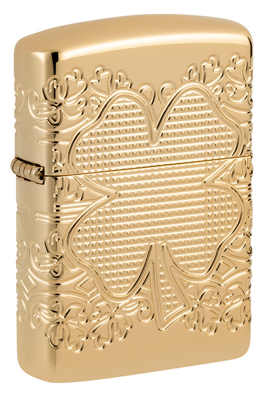 Front shot of Zippo Lucky Clover Design ArmorÂ® High Polish Gold Plate Windproof Lighter standing at a 3/4 angle.