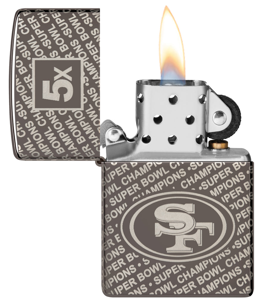 Zippo NFL San Francisco 49ers Super Bowl Commemorative Armor Black Ice Windproof Lighter with its lid open and lit.
