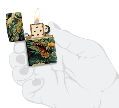Zippo Dragon Fusion Design 540 Tumbled Brass Windproof Lighter lit in hand.