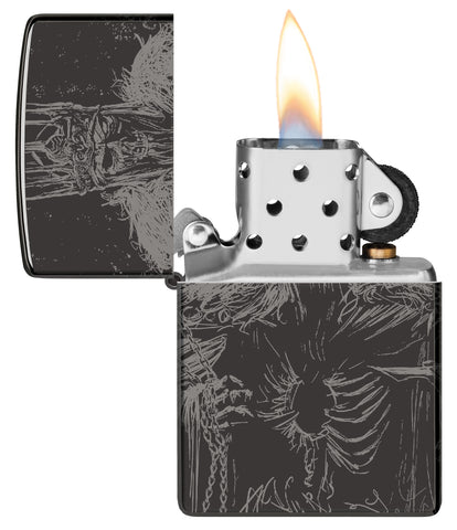 Zippo Skull King Design High Polish Black Windproof Lighter with its lid open and lit.