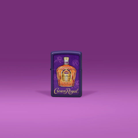 Lifestyle image of Zippo Crown Royal Design Purple Matte Windproof Lighter standing in a purple scene.