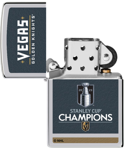 2023 Stanley Cup® Champions Vegas Golden Knights Windproof Lighter lit in hand.