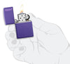 Purple Matte windproof lighter lit in hand