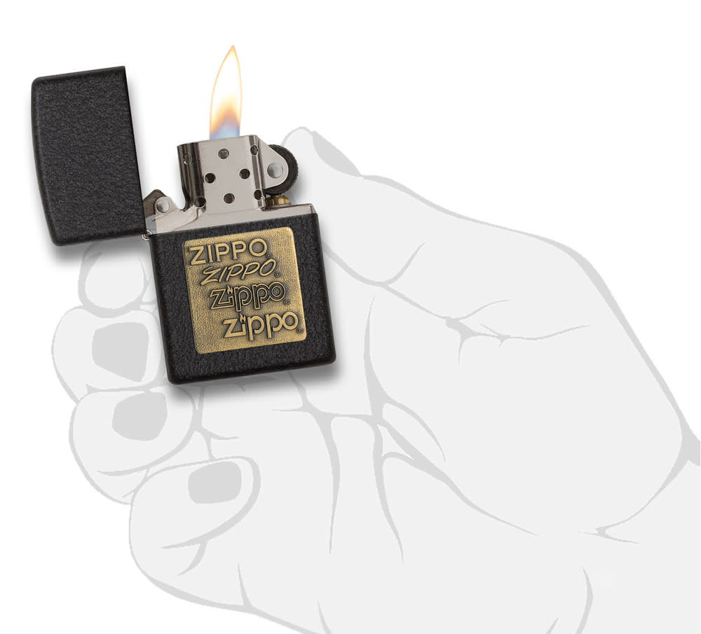 Front view of the Black CrackleÂ® Brass Zippo Logo Emblem Lighter, in hand, open and lit
