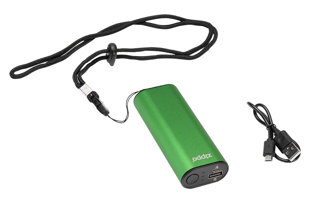 Green HeatBankÂ® 6 Rechargeable Hand Warmer with its included lanyard and USB charging chord