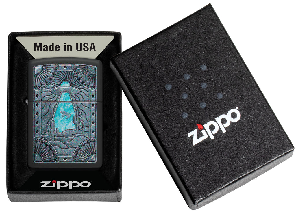 Zippo UFO Cow Black Matte Windproof Lighter in its packaging.