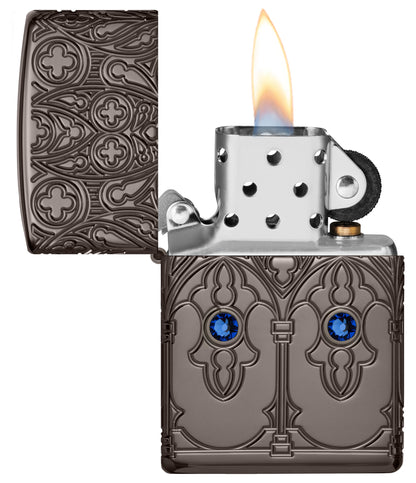 Zippo Gothic Window Design ArmorÂ® Black IceÂ® Windproof Lighter with its lid open and lit.