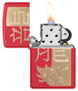 Zippo Year of the Dragon 2024 Red Matte Windproof Lighter with its lid open and lit.