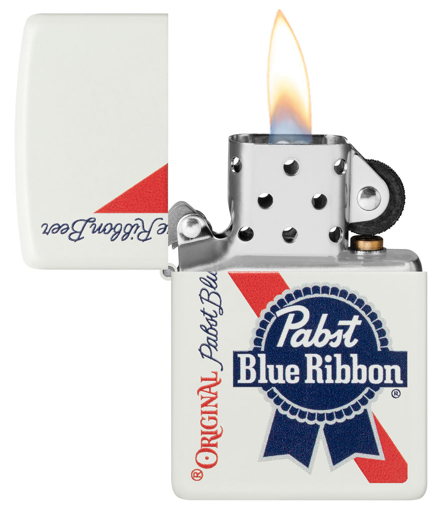 Zippo Pabst Blue Ribbon Design White Matte Windproof Lighter with its lid open and lit.