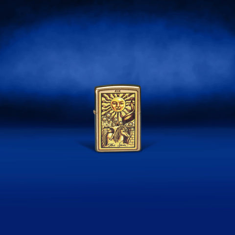 Lifestyle image of Zippo Tarot Card Brushed Brass Windproof Lighter.