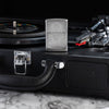 Lifestyle image of Zippo Vintage Dance Design Satin Chrome Windproof Lighter sitting on a record player.
