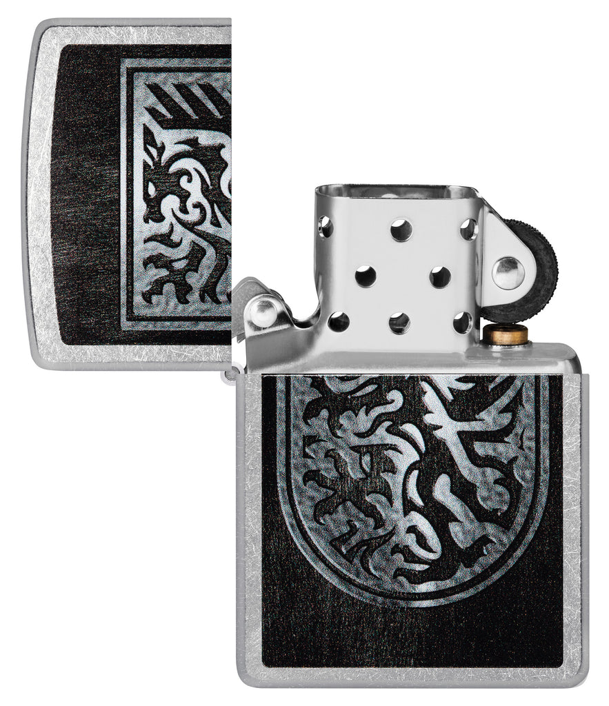Zippo Dragon Shield Design Street Chrome Windproof Lighter with its lid open and unlit.