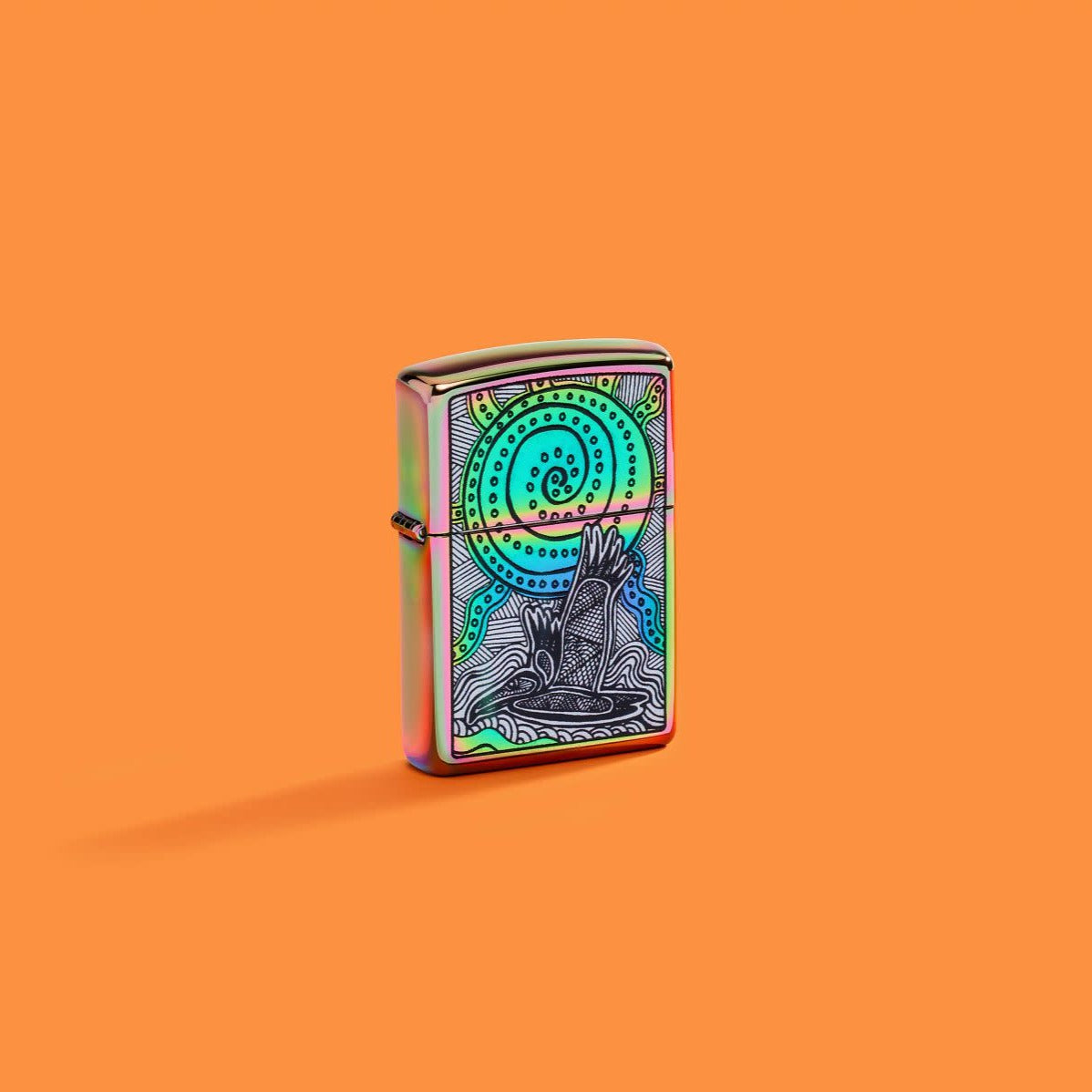 Lifestyle image of Zippo John Smith Gumbula Multi-Color Windproof Lighter on an orange background.