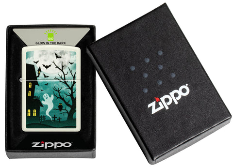 Zippo Spooky Design Glow in the Dark Green Windproof Lighter in its packaging.