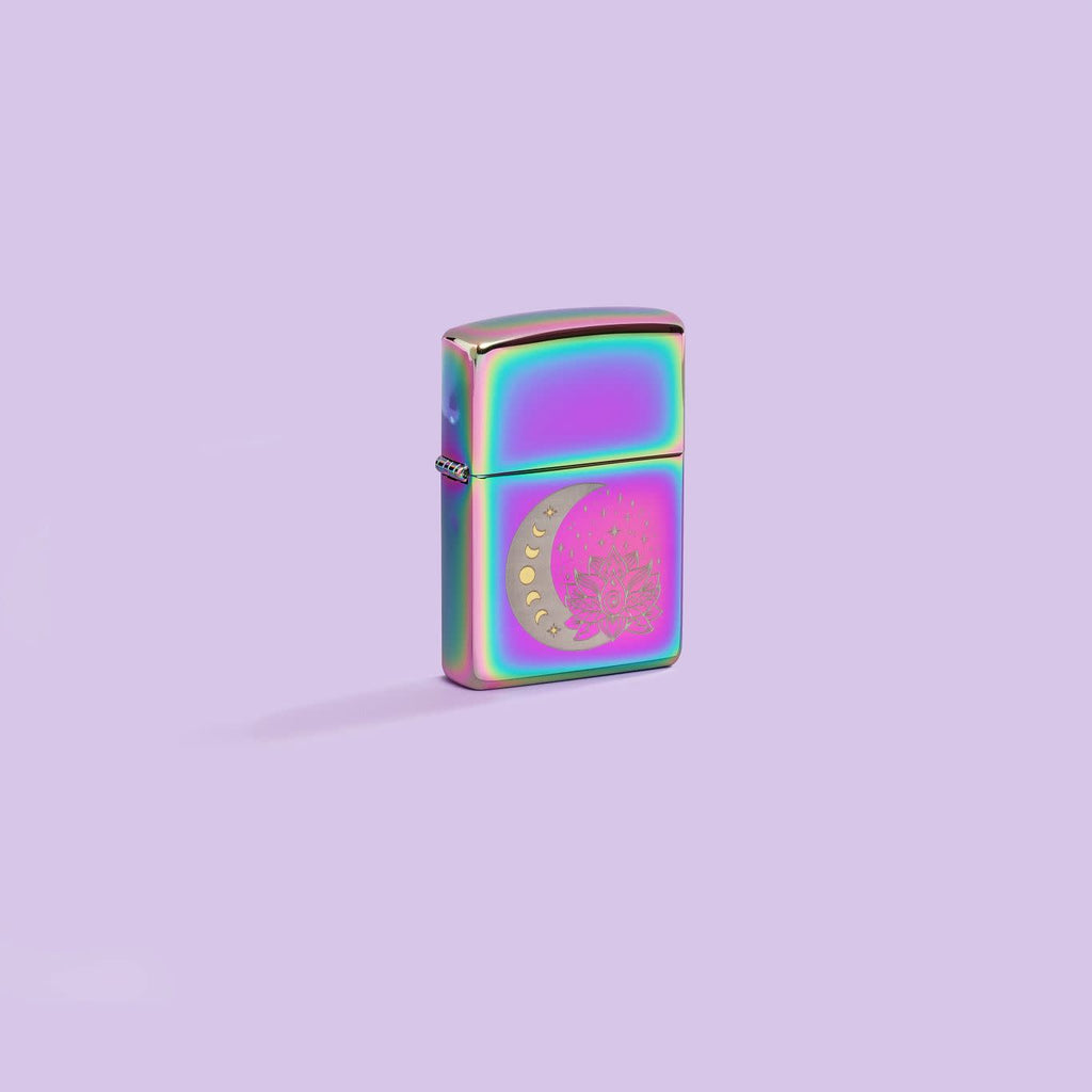 Lifestyle image of Zippo Spiritual Multi-Color Windproof Lighter on a pastel purple background.