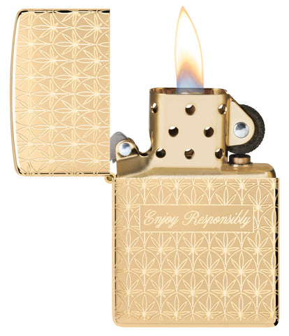 Zippo Enjoy Responsibly Design High Polish Brass Windproof Lighter with its lid open and lit.