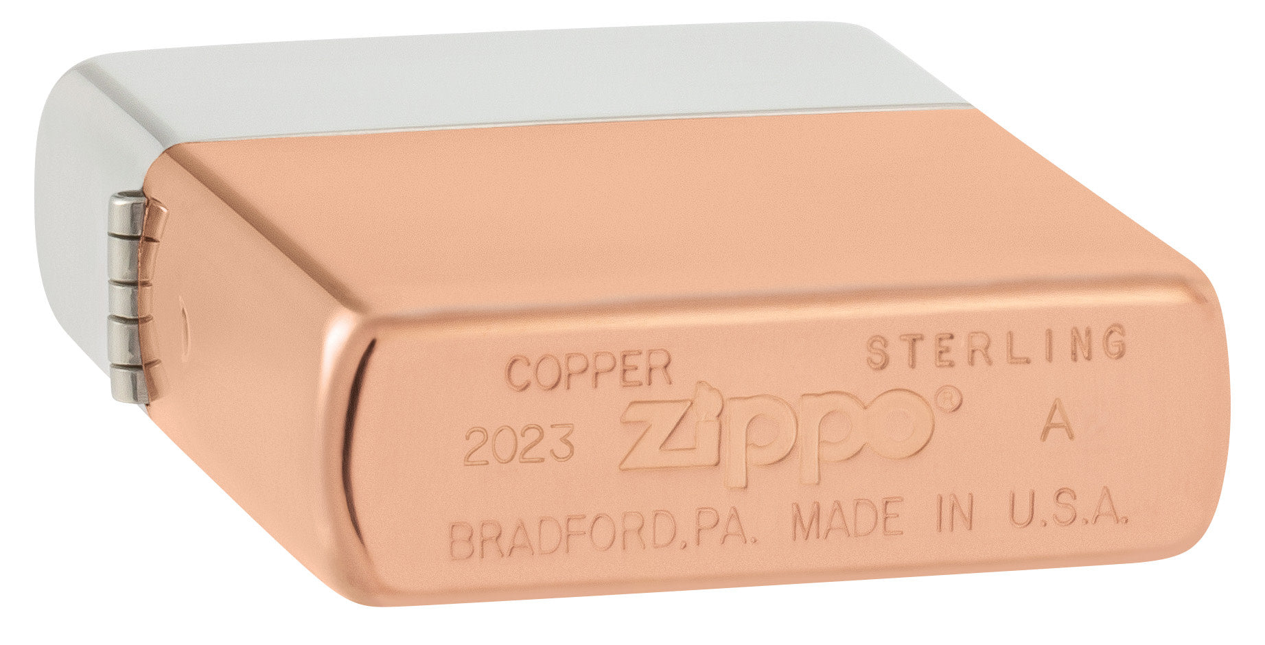 Zippo Bimetal Case Lighter - Copper Lid Windproof Lighter laying down showing the bottom stamp.