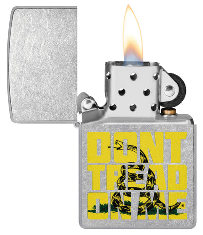 Zippo Donâ€™t Tread on Me Street Chrome Windproof Lighter with its lid open and lit.