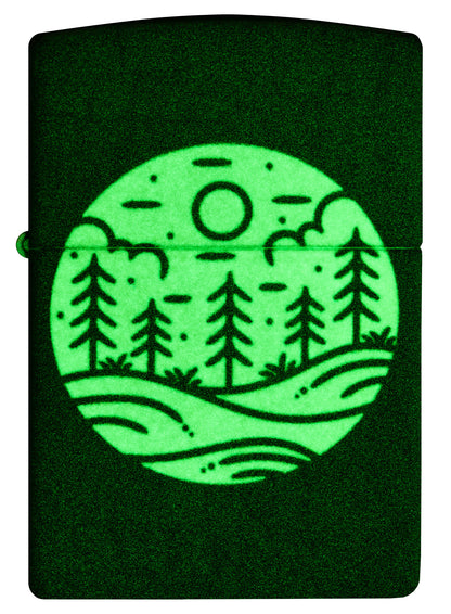 Front view of Zippo Moonlit Field Design 540 Color Glow in the Dark Windproof Lighter glowing in the dark.