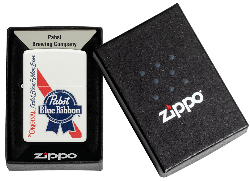 Zippo Pabst Blue Ribbon Design White Matte Windproof Lighter in its packaging.