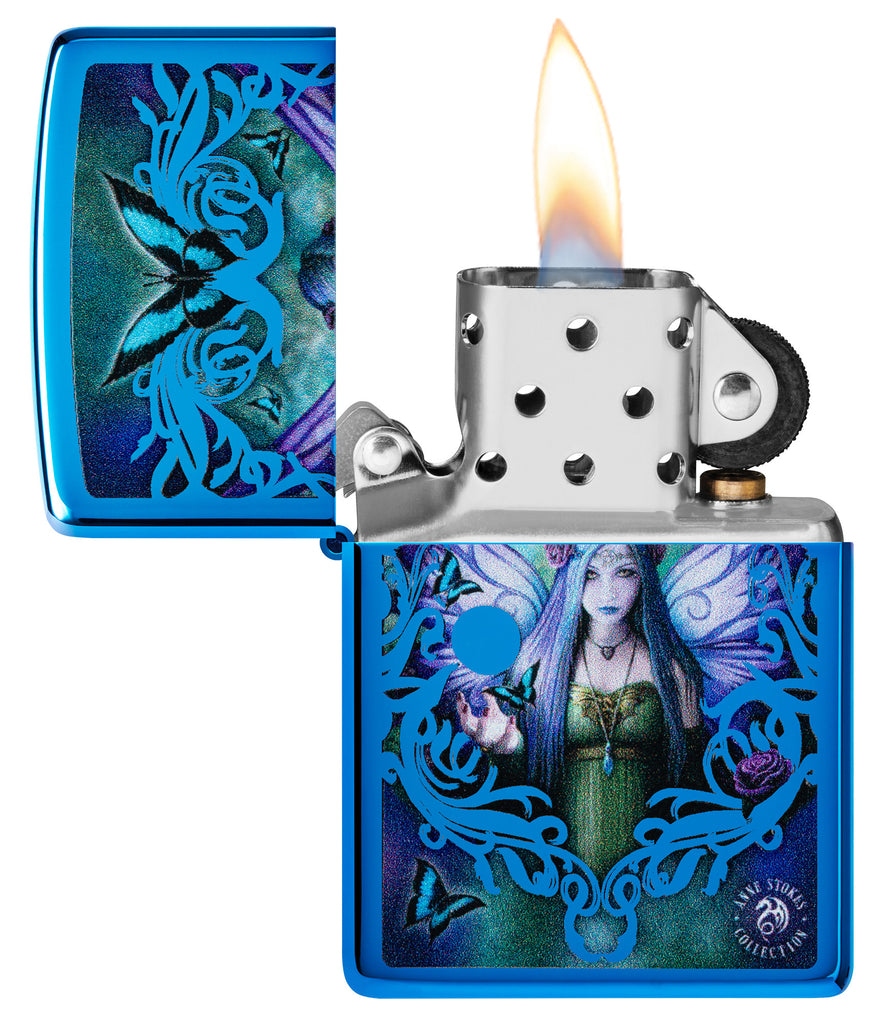Zippo Anne Stokes Collection High Polish Blue Windproof Lighter with its lid open and lit.