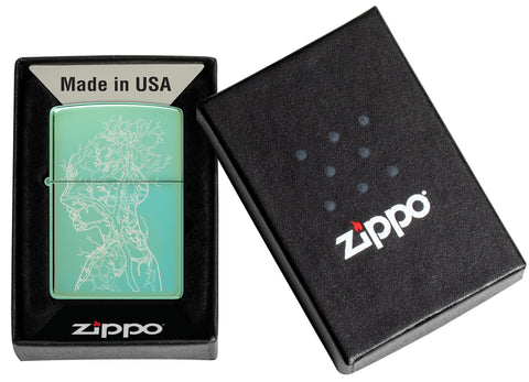 Zippo Human Tree Design High Polish Green Windproof Lighter in its packaging.