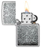 Zippo Vines Design Street Chrome Windproof Lighter with its lid open and lit.