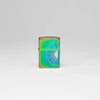 Lifestyle image of Zippo Daisy Design Multi Color Windproof Lighter standing in a grey scene.