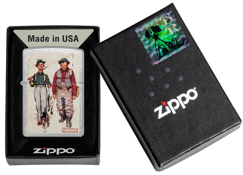Zippo Norman Rockwell Fishing Street Chrome Windproof Lighter in its packaging.