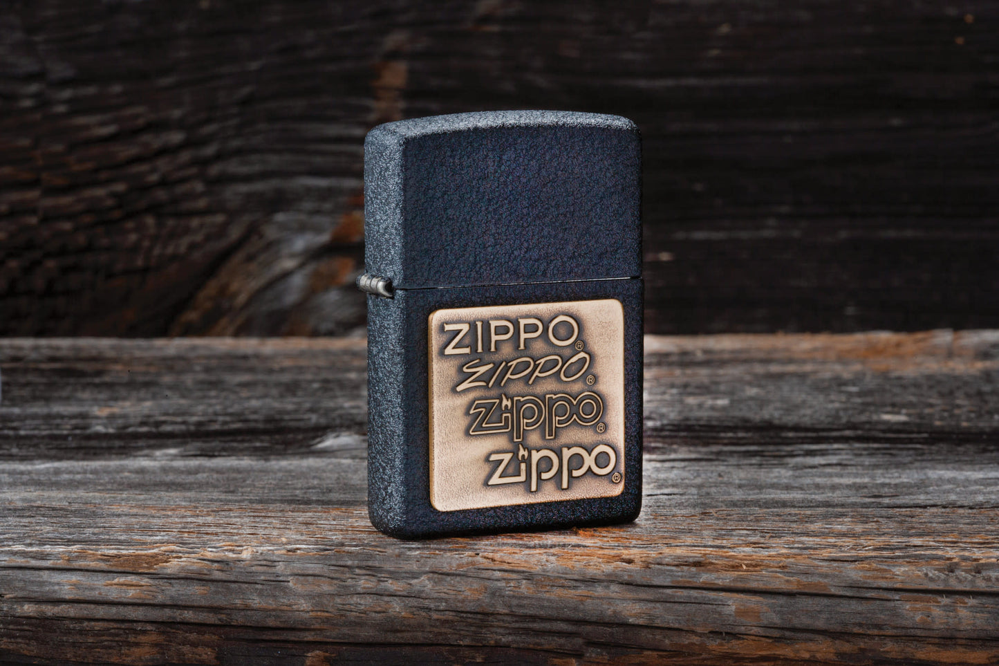Lifestyle image of the Black CrackleÂ® Brass Zippo Logo Emblem Lighter 
