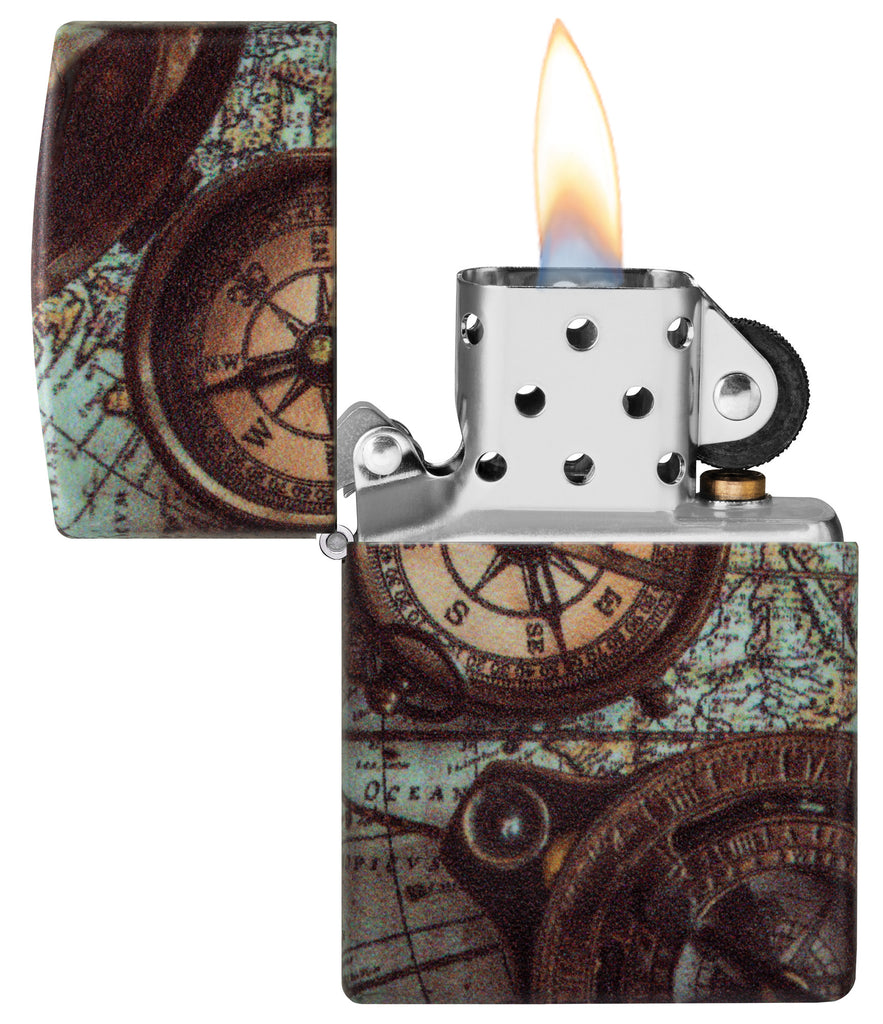 Zippo Compass Design 540 Matte Windproof Lighter with its lid open and lit.