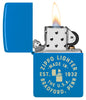 Zippo Seal Design Sky Blue Matte Windproof Lighter with its lid open and lit.