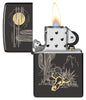 Zippo Western Design High Polish Black Windproof Lighter with its lid open and lit.