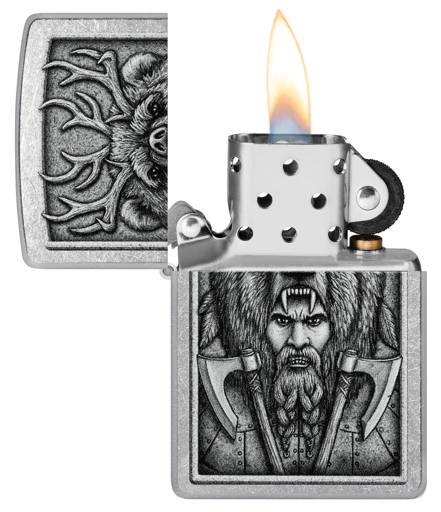 Zippo Barbarian Design Street Chrome Windproof Lighter with its lid open and lit.