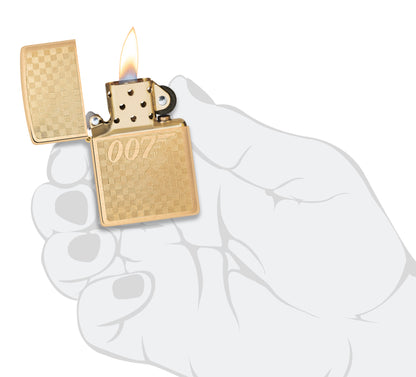 Zippo Textured James Bond 007â„¢ Design Brushed Brass Windproof Lighter lit in hand.