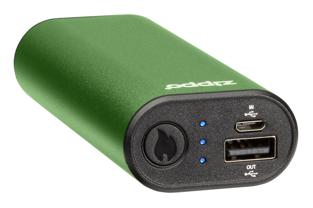 Green HeatBankÂ® 6 Rechargeable Hand Warmer laying flat, showing the power button, the light indicators, and the in/out ports.