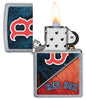 MLB® Boston Red Sox™ Street Chrome™ Windproof Lighter with its lid open and lit.