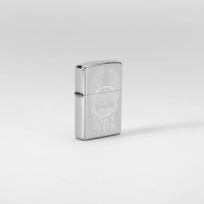 Glamour shot of Zippo Dreamcatcher Design High Polish Chrome Windproof Lighter standing in a white scene.