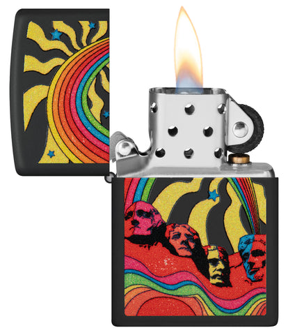 Zippo Hippie Mt Rushmore Design Black Matte Windproof Lighter with its lid open and lit.