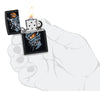 Zippo Darts Design Black Matte Windproof Lighter lit in hand.